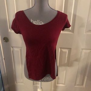 Burgundy speckled shirt. Size small. Sides are partially open